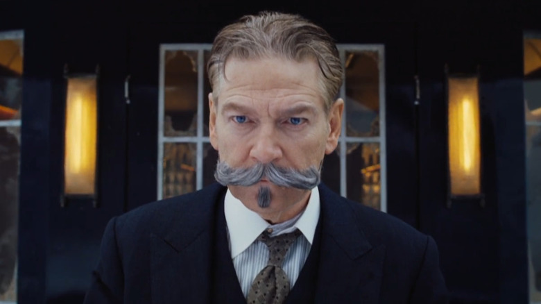 Murder on the Orient Express (2017), Poirot with his giant moustache, on the case