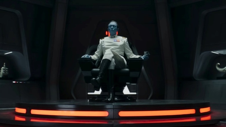 Lars Mikkelsen as Grand Admiral Thrawn sitting on a captain's chair inside a spaceship in Ahsoka