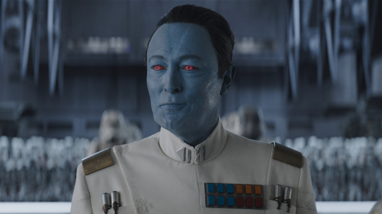 Lars Mikkelsen as Grand Admiral Thrawn standing in front of his army in Ahsoka