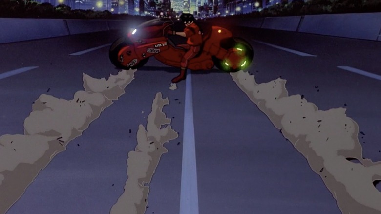 Kaneda swerves his bike
