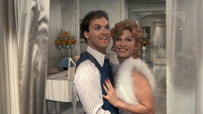 Johnny and Lil smiling out at the world in Johnny Dangerously