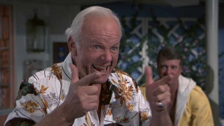 Alan Hale Jr.'s Gus Dolan makes finger guns in The Love Boat