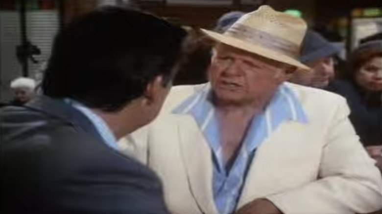 Alan Hale Jr's Patrick Gilhooley sits talking to Jerry Orbach's Harry McGraw at a bar in The Law and Harry McGraw