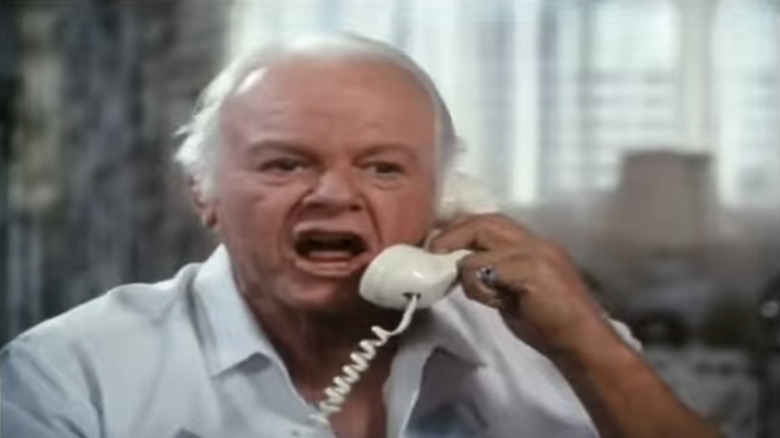Alan Hale Jr's Patrick Gilhooley talks on a phone in The Law and Harry McGraw