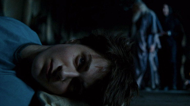 Daniel Radcliffe, Michael Gambon, and Alan Rickman in Harry Potter and the Prisoner of Azkaban