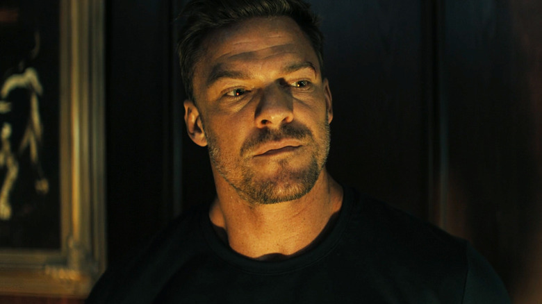 Alan Ritchson's Jack Reacher looks despondent in Reacher