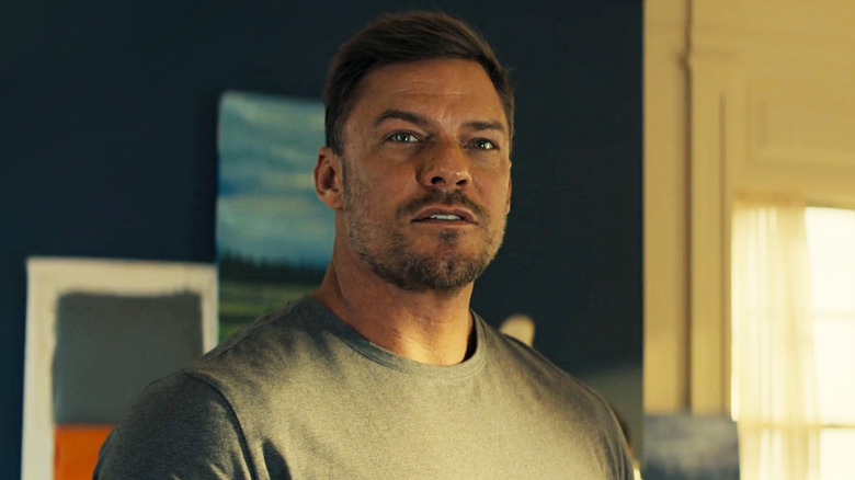 Alan Ritchson's Jack Reacher is seen in closeup in Reacher