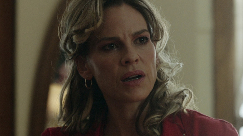 Hilary Swank's Sharon Stevens looks off to her left in closeup in Ordinary Angels