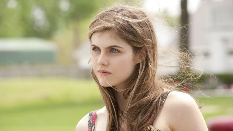 Lisa Tragnetti, looking intense outdoors in a park on True Detective