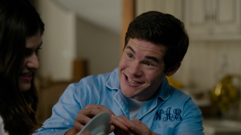 Noah in blue pajamas smiling at Avery in When We First Met