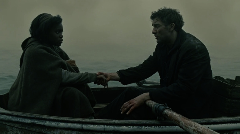 Clare-Hope Ashitey and Clive Owen in Children of Men