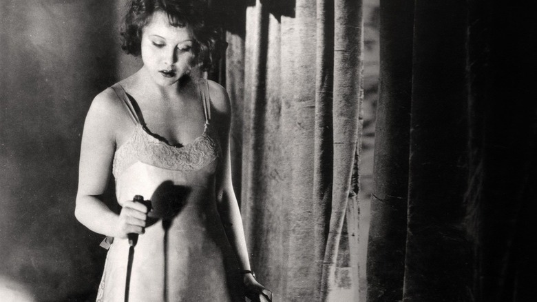 Femme fatale holds knife