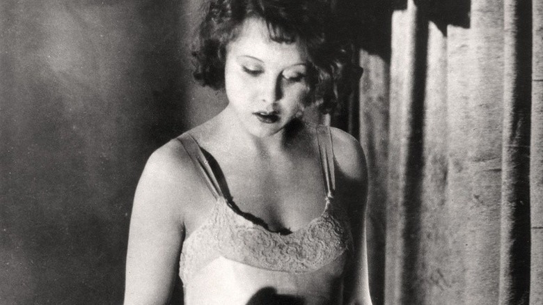 Femme fatale looks down