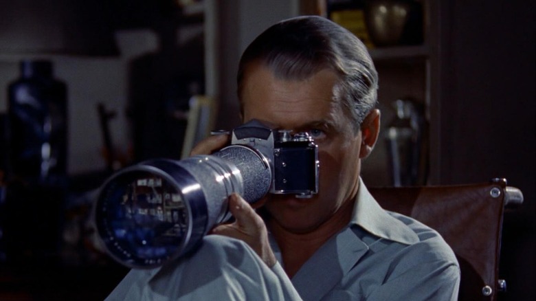 James Stewart in Rear Window spies on neighbors