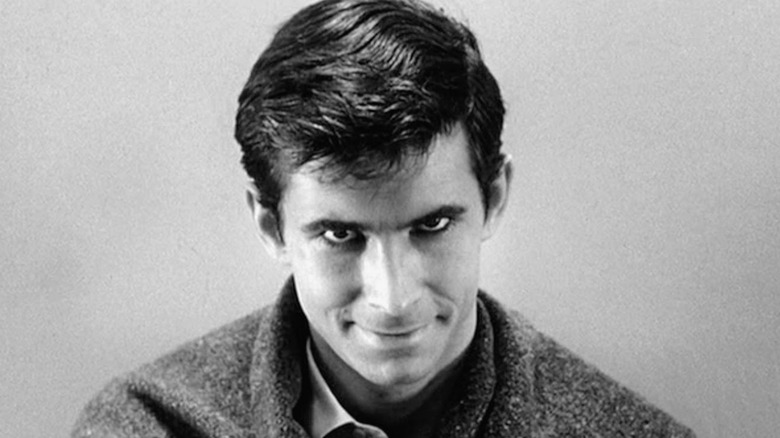 Anthony Perkins stares at the camera
