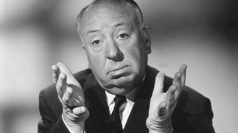 Alfred Hitchcock opens an episode of Alfred Hitchcock