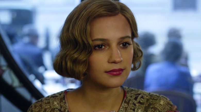 Alicia Vikander as Gerda Wegener listening intently in The Danish Girl