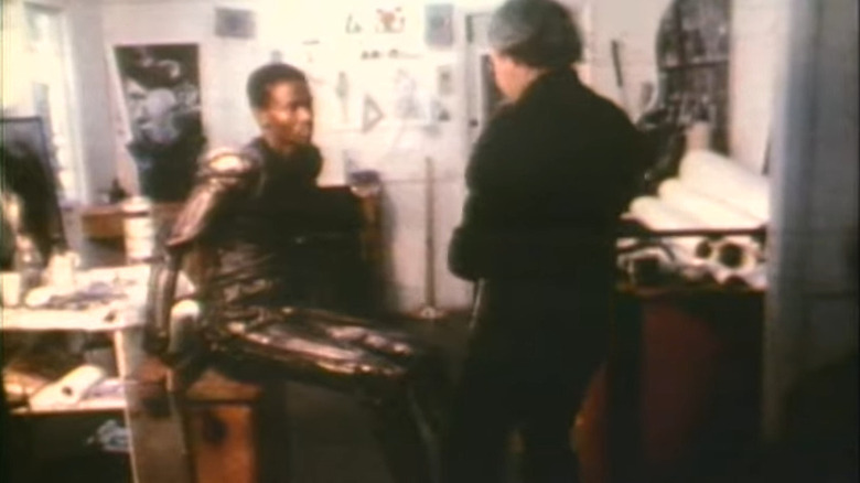 H.R. Giger and Bolaji Badejo in a workshop 