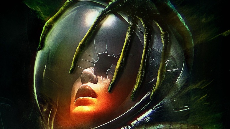 Space suit with facehugger attached