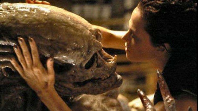 Ripley caresses an adorably freaky Xenomorph in Alien: Resurrection