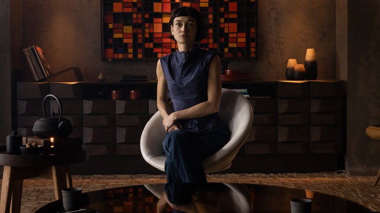 Sydney Chandler as the Hybrid Wendy sitting in a chair in Alien: Earth