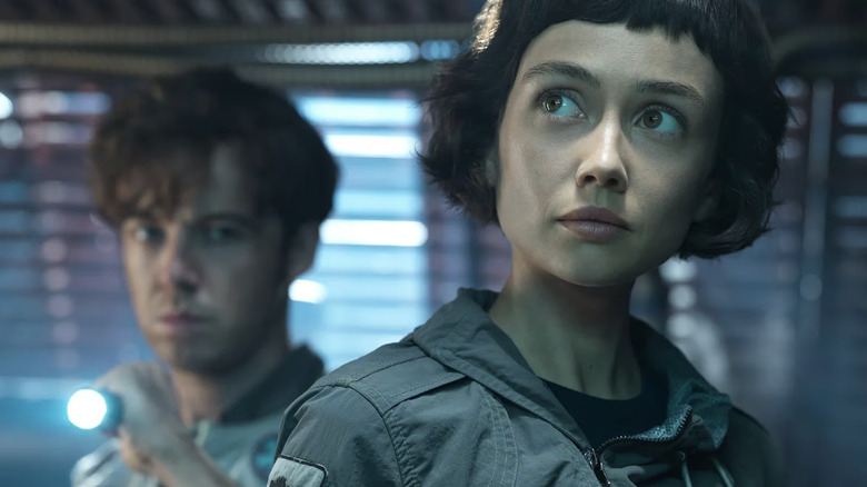 Hermit and Wendy looking around a room in Alien: Earth
