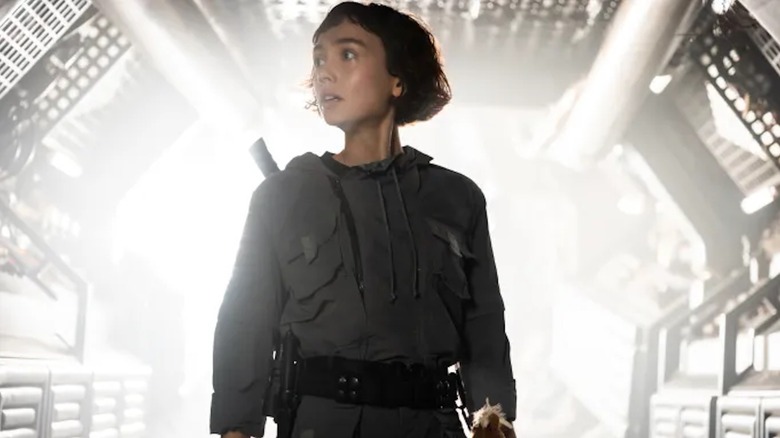 Sydney Chandler is backlit and very afraid as Wendy in Alien: Earth