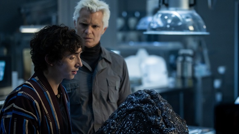 Boy Kavalier drools over a Xenomorph egg while Kirsh looks over concerned in Alien: Earth