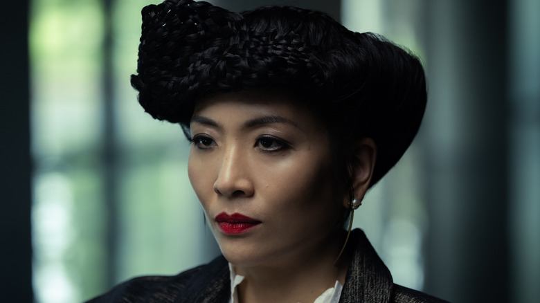 Yutani looking stern with a fancy hairdo at a meeting with Prodigy in Alien: Earth