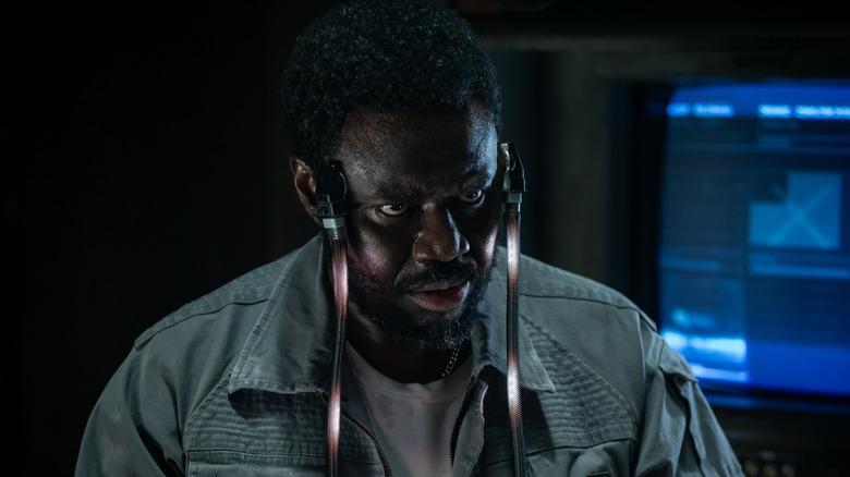 Morrow downloading data into his cybernetic brain in Alien: Earth