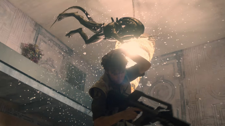 A xenomorphs leaps to the attack on a poor, sure-to-be-dead human in Alien: Earth