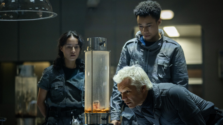 Tootles, Curly, and Kirsh investigating Species 64 at the Neverland research lab in Alien: Earth