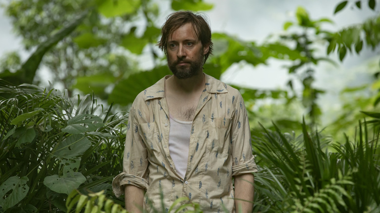 Arthur Sylvia standing in the jungle near Neverland in Alien: Earth