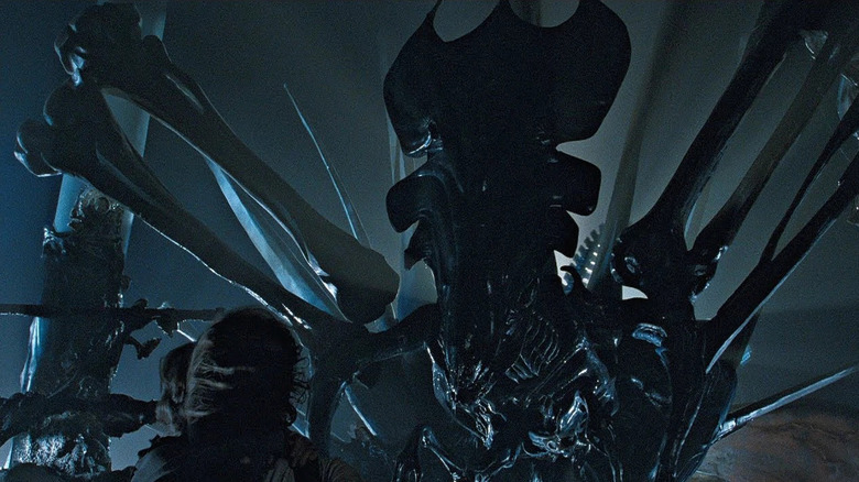Ripley (Sigourney Weaver) faces off with an alien queen in Aliens (1986)