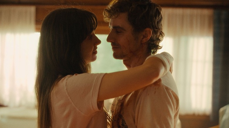 Millie and Tim embrace in TOGETHER