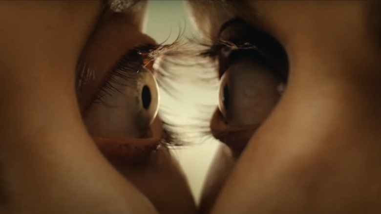 Millie and Tim's eyes linking up in TOGETHER