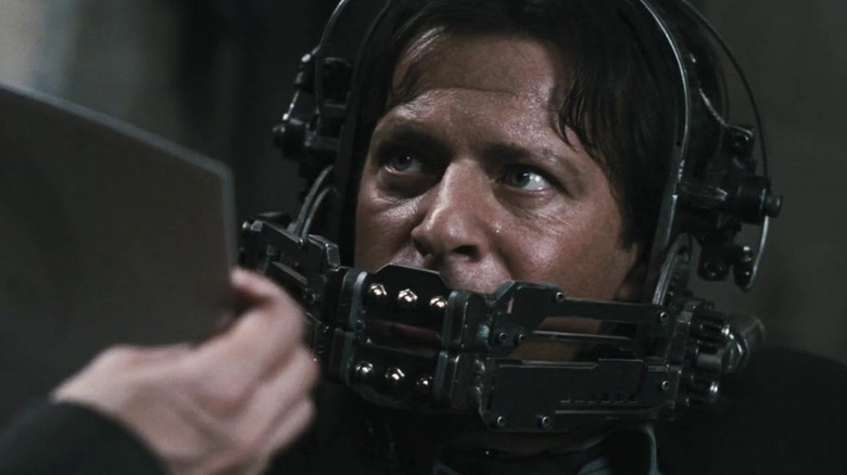 Costas Mandylor as Mark Hoffman trying to get out of a reverse bear trap in Saw VI