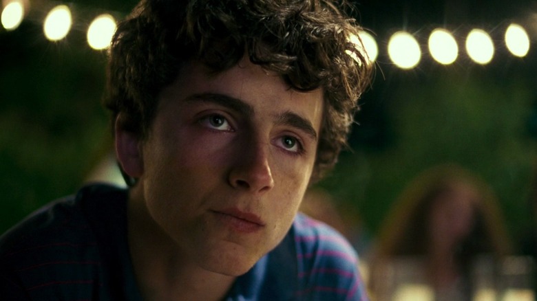 Timothée Chalamet as Elio Perlman, looking sullen in Call Me By You Name