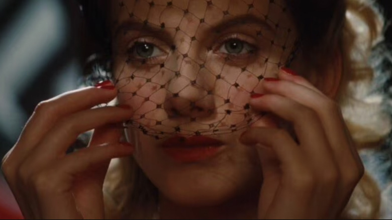 Mélanie Laurent as Shosanna Dreyfus pulling down her black veil while getting ready in Inglourious Basterds