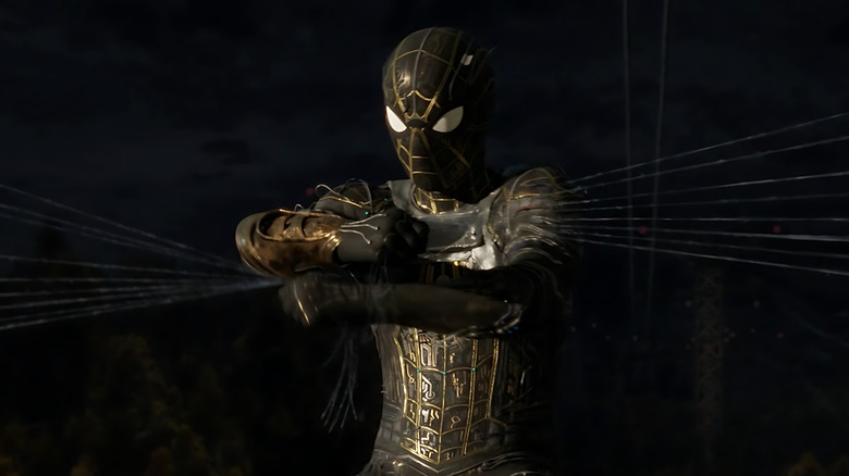 Spider-Man, dressed in the Inside Out suit, holding webs together in Spider-Man: No Way Home