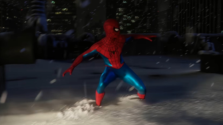 Spider-Man slides through snow in a new homemade suit in Spider-Man: No Way Home