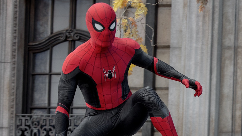 Spider-Mans kneels in his own upgraded suit in Spider-Man: Far From Home