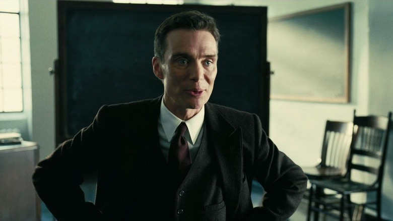 Cillian Murphy as J. Robert Oppenheimer, giving a university lesson in Oppenheimer.