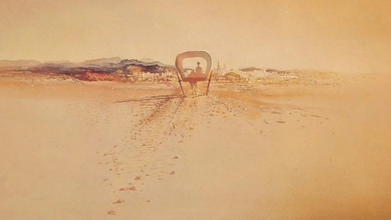 A covered wagon crosses a desert on the cover of Blood Meridian