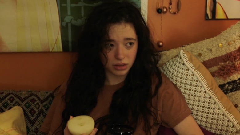 Mikey Madison as Max Fox holding an onion on Better Things