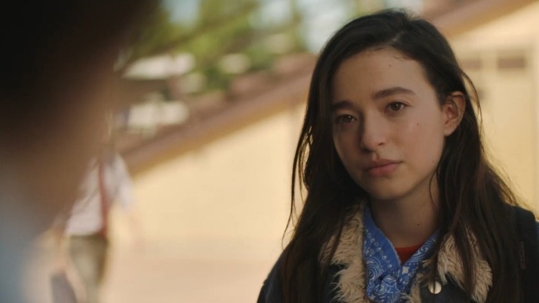 Mikey Madison as Kat staring sternly in disapproval in It Takes Three