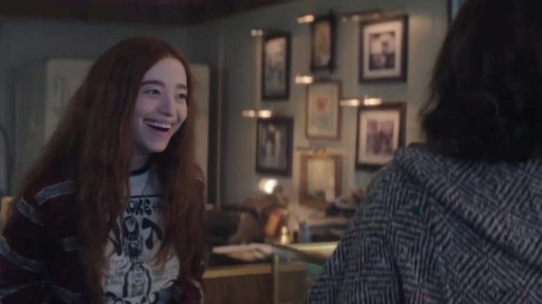 Mikey Madison as Judith Weinstein laughing while talking to Natalie Portman as Maddie Schwartz on Lady in the Lake