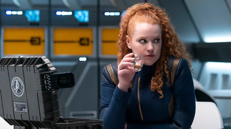 Sylvia Tilly (Mary Wiseman) looks warily as she has a drink in Star Trek: Short Treks