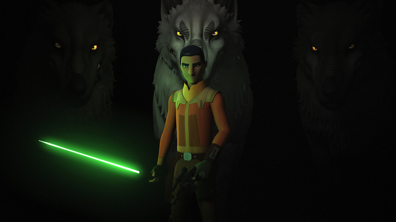 Ezra Bridger stands before the Loth-wolves in Star Wars Rebels