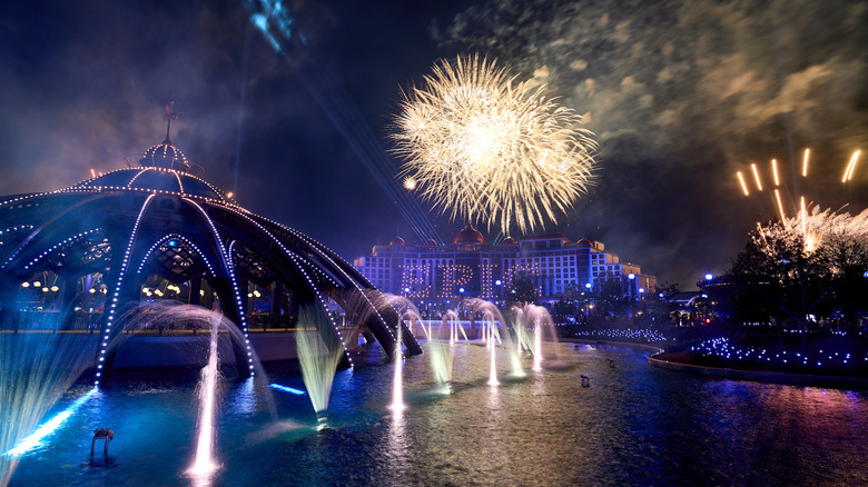 Fireworks explode over Constellation Carousel at Epic Universe